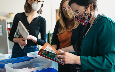 UBC librarians reviewing Indigenous children's literature.